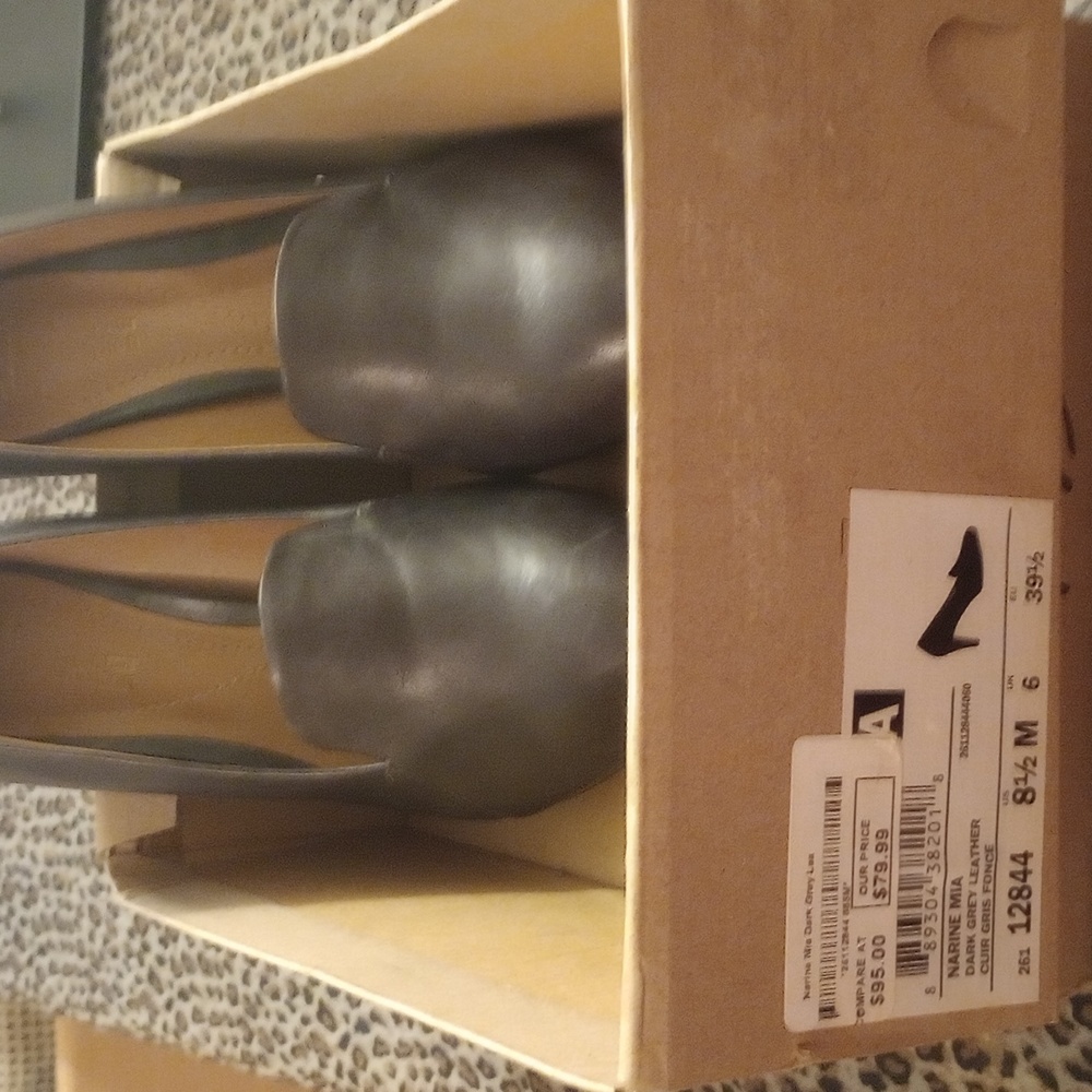 Clark's dark gray leather pumps.
